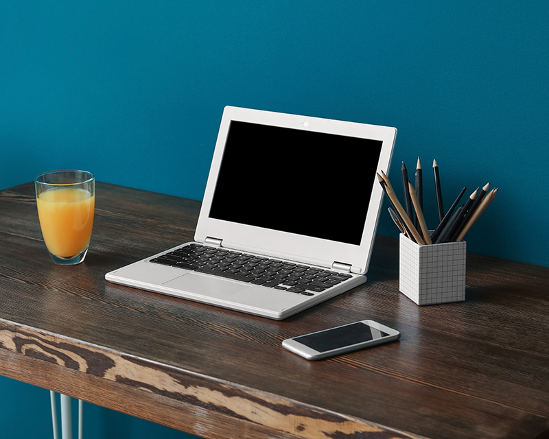 Laptop on a desk for online counseling with Shannon